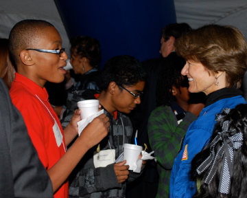 A student chatting with Sally Ride