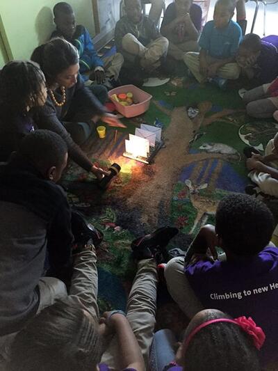 Media Name: Ms.-Ramsey-and-her-scientists.jpg