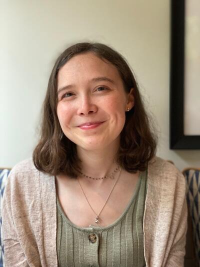 Isabel Hardy is smiling.